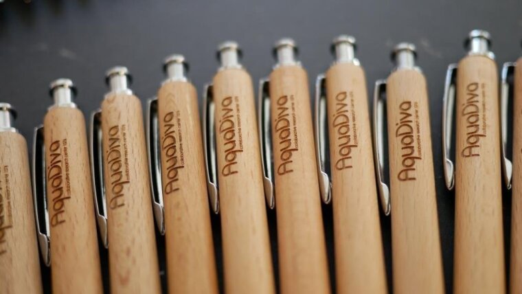 Several AquaDiva pens in a row